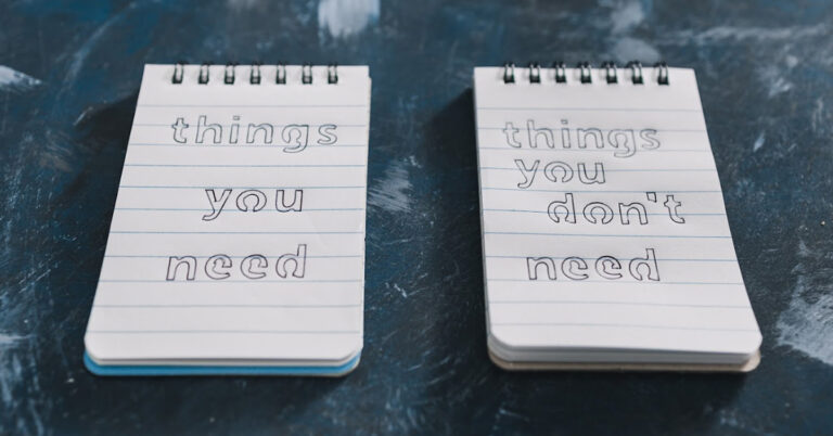 Two small notebooks on a table